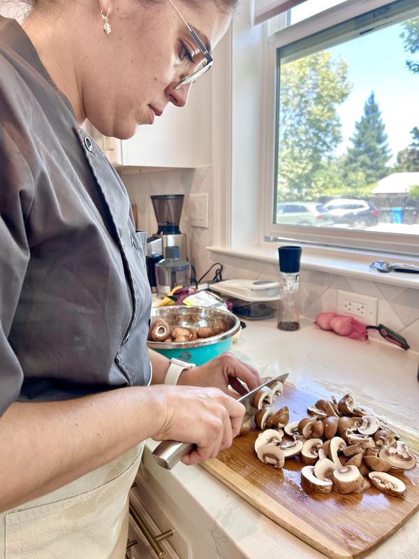 Chef Silmara preparing mushrooms